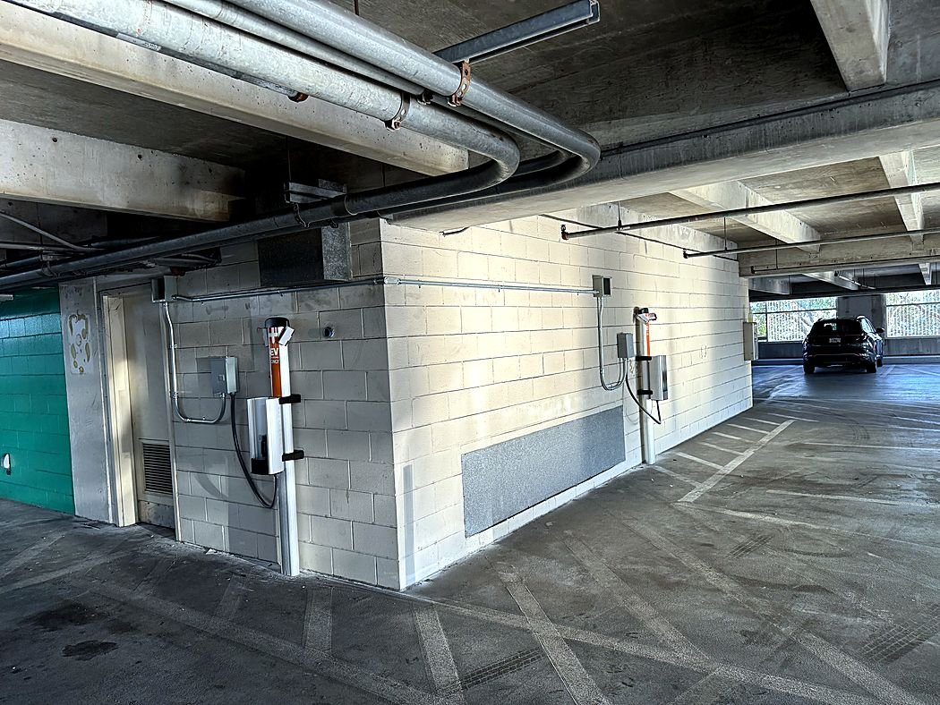 EV charging stations installed in a parking garage