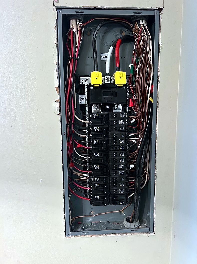 Flush-mounted interior panel with new breakers