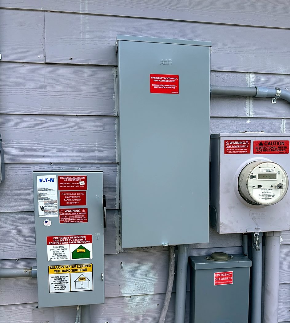 Exterior emergency service disconnect, bi-directional meter and solar PV disconnect on a home