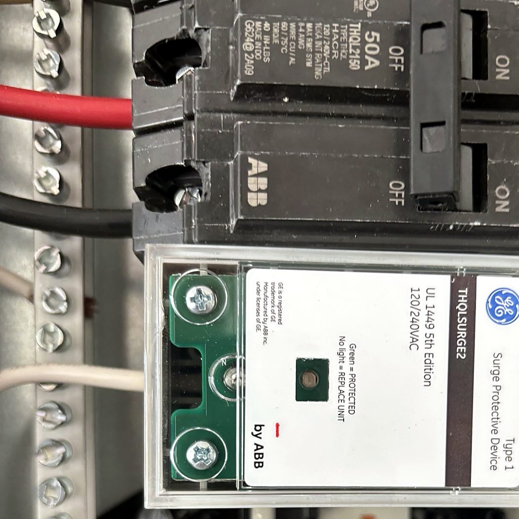 Close-up of a Type 1 surge protective device installed in the panel